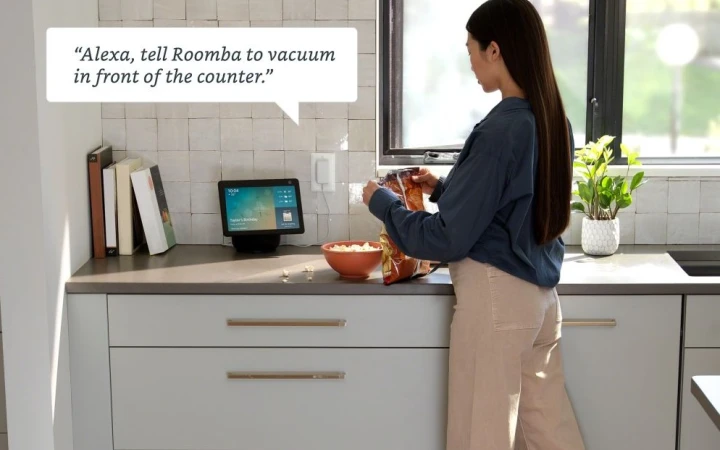 Roomba max vac autoempty photo lifestyle woman popcorn alexa x aaecadbfadcca